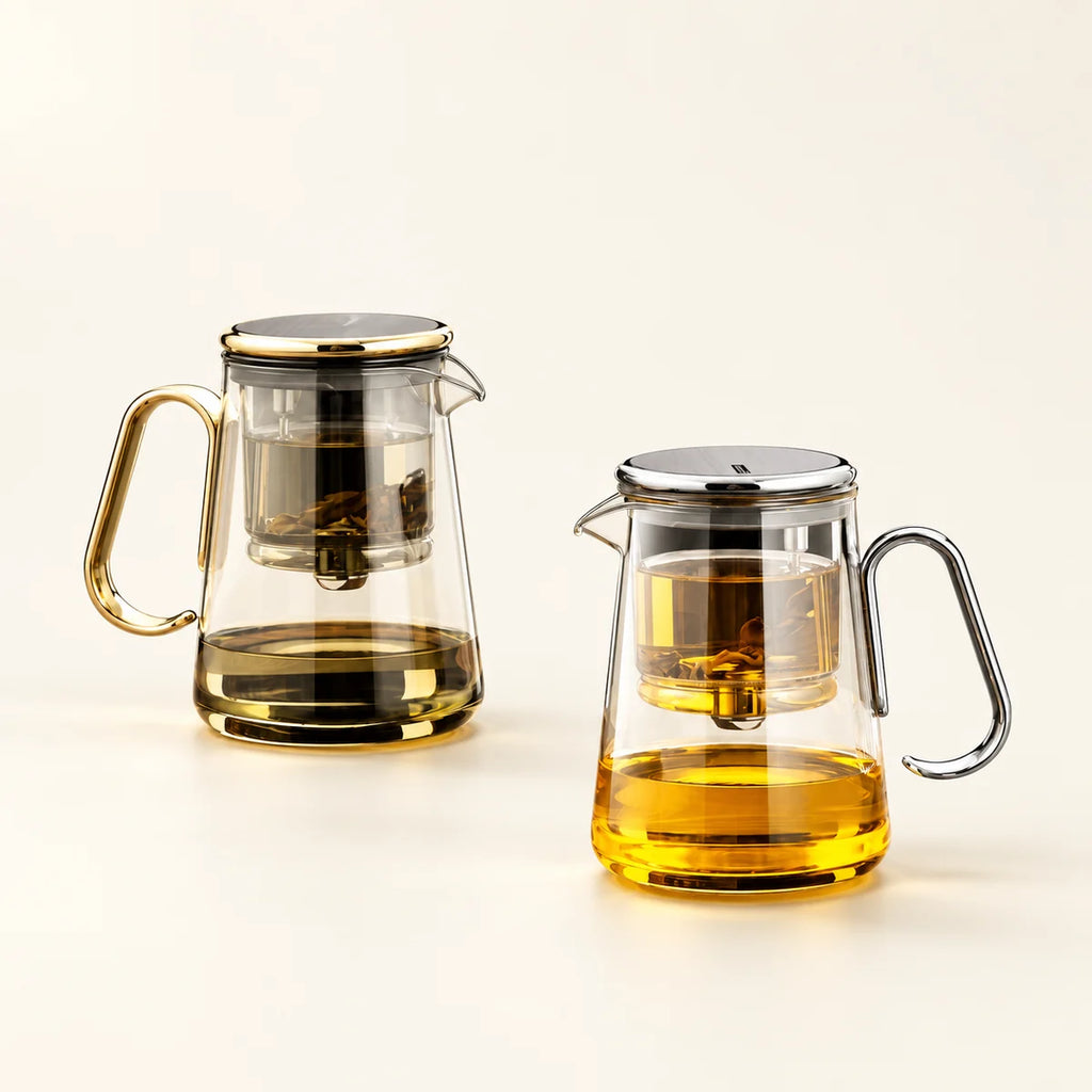 Alora Glass Teapot on a warm ivory studio background