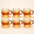 Amber Ripple Glass Tea Cups — Set of 6 on a warm ivory studio background