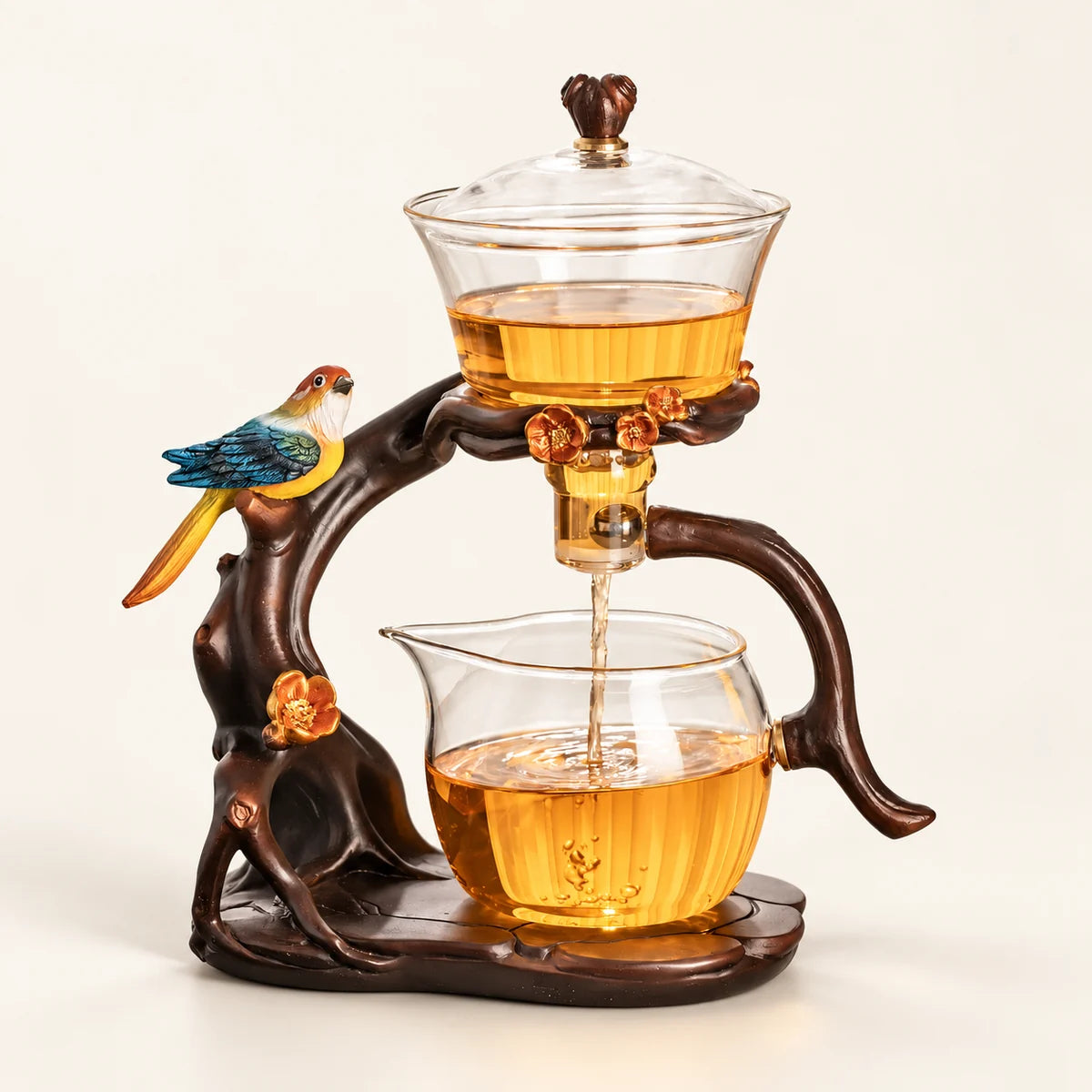 Bird Glass Tea Brewer on a warm ivory studio background