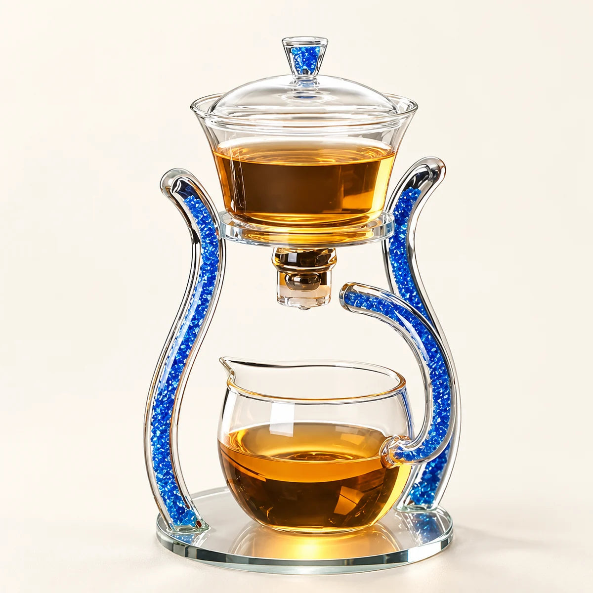 Blue Palace Glass Tea Brewer on a warm ivory studio background