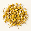 Chamomile Flower Tea — 20g on a warm ivory studio background