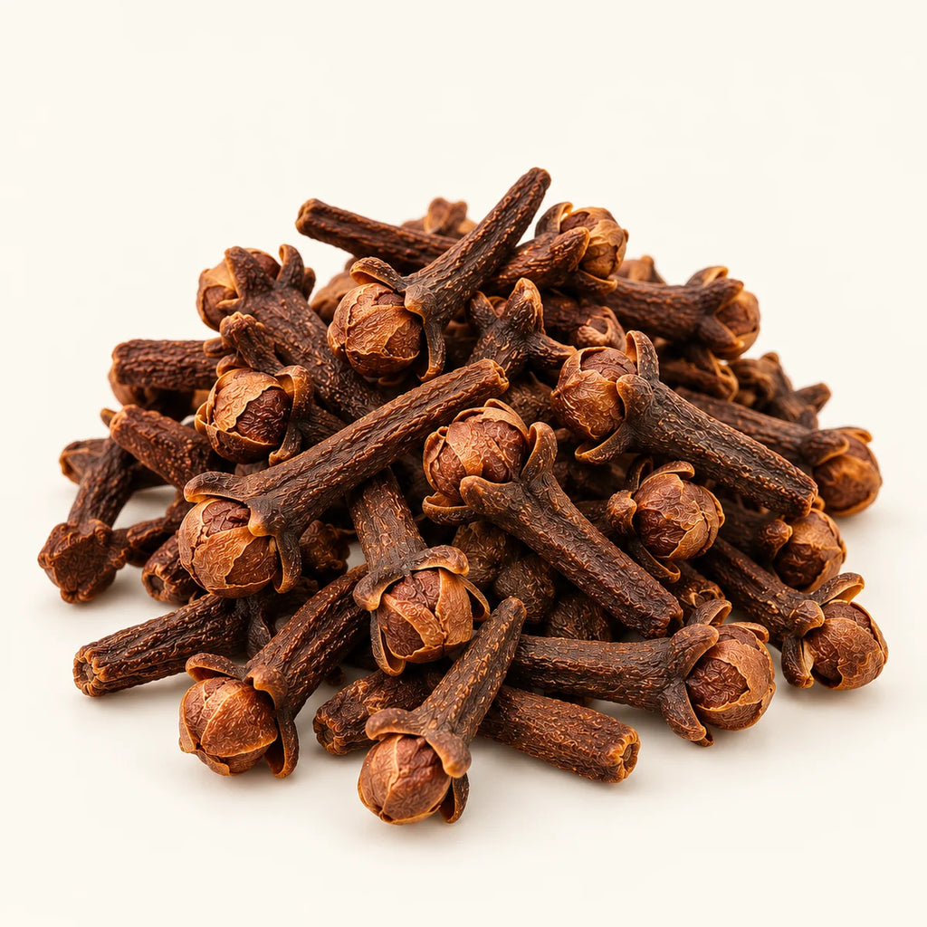 Cloves — 50g on a warm ivory studio background