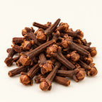 Cloves — 50g on a warm ivory studio background