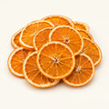 Dried Orange Slices — 50g on a warm ivory studio background