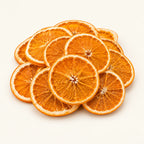 Dried Orange Slices — 50g on a warm ivory studio background