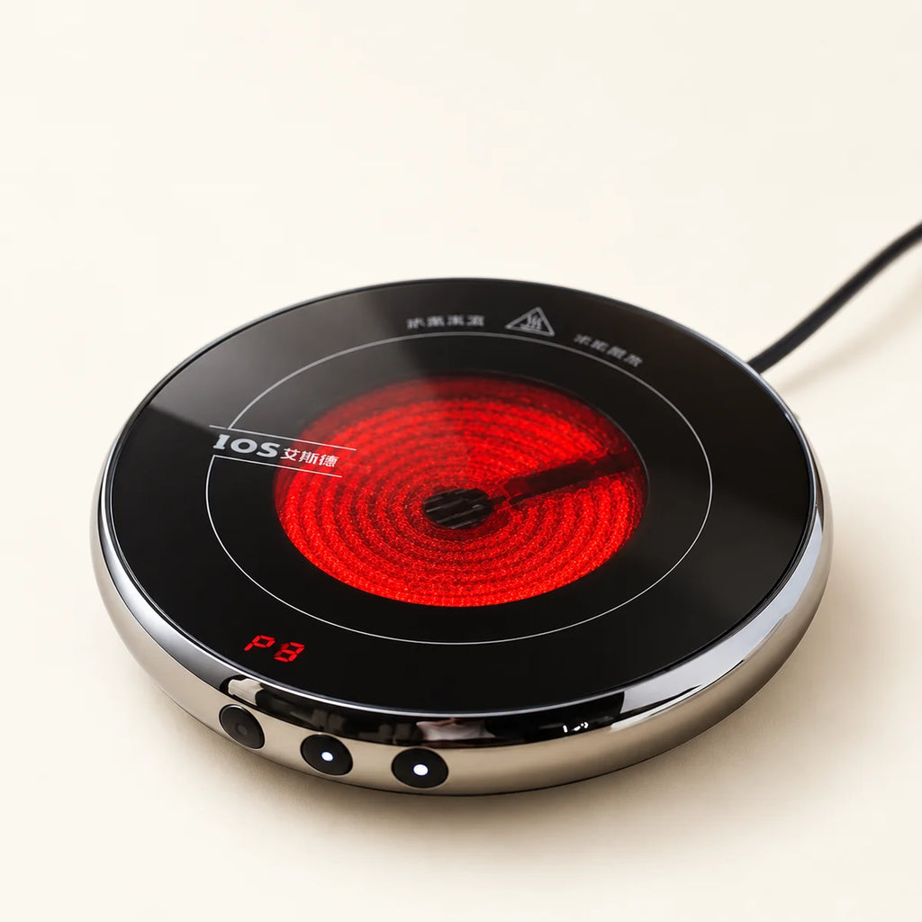 Electric Tea Warming Stove — 1000W, 220V on a warm ivory studio background