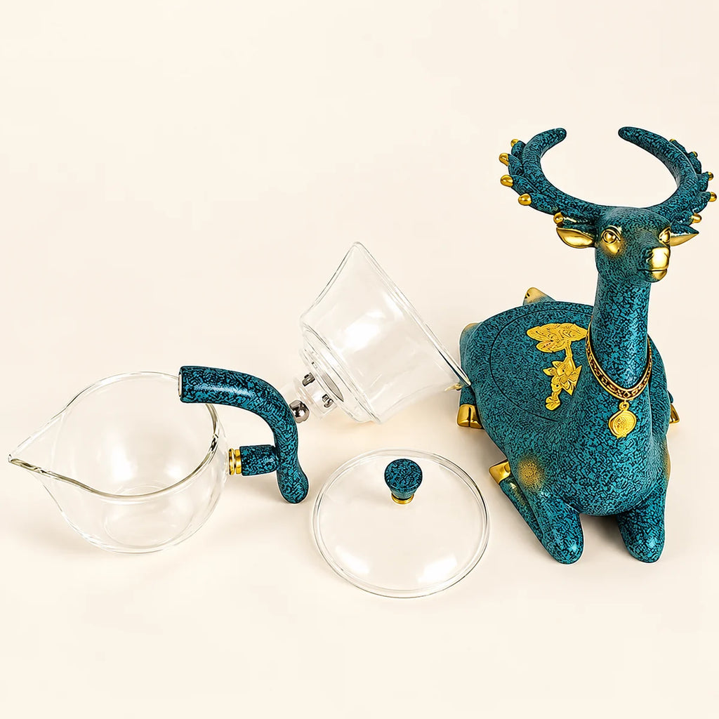 Elk Glass Tea Set on a warm ivory studio background