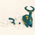 Elk Glass Tea Set on a warm ivory studio background