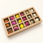 Flowering Pu'er Tea Gift Box — 18 Balls on a warm ivory studio background