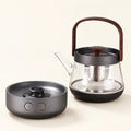 Glass Tea Kettle & Electric Stove — 220V on a warm ivory studio background