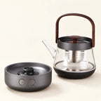 Glass Tea Kettle & Electric Stove — 220V on a warm ivory studio background