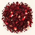 Hibiscus Flower Tea — 30g on a warm ivory studio background