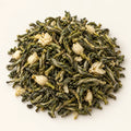 Jasmine Green Tea — 3 oz on a warm ivory studio background