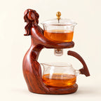 Lady in Red Teapot on a warm ivory studio background