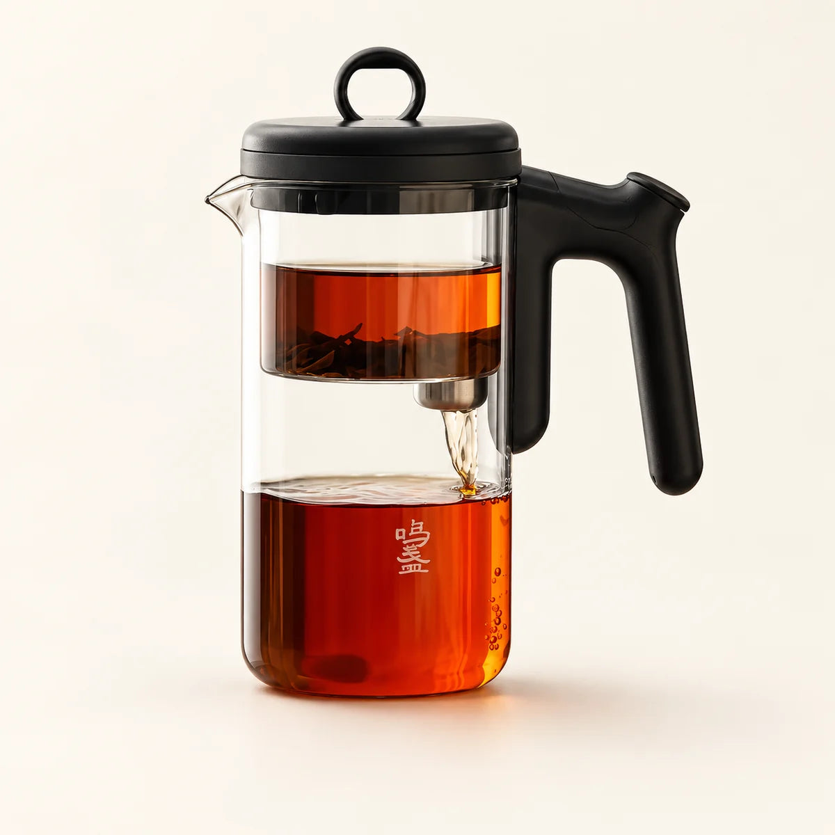 Magnetic Glass Infuser Teapot on a warm ivory studio background