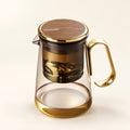 Magnetic Glass Tea Infuser on a warm ivory studio background