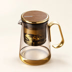 Magnetic Glass Tea Infuser on a warm ivory studio background