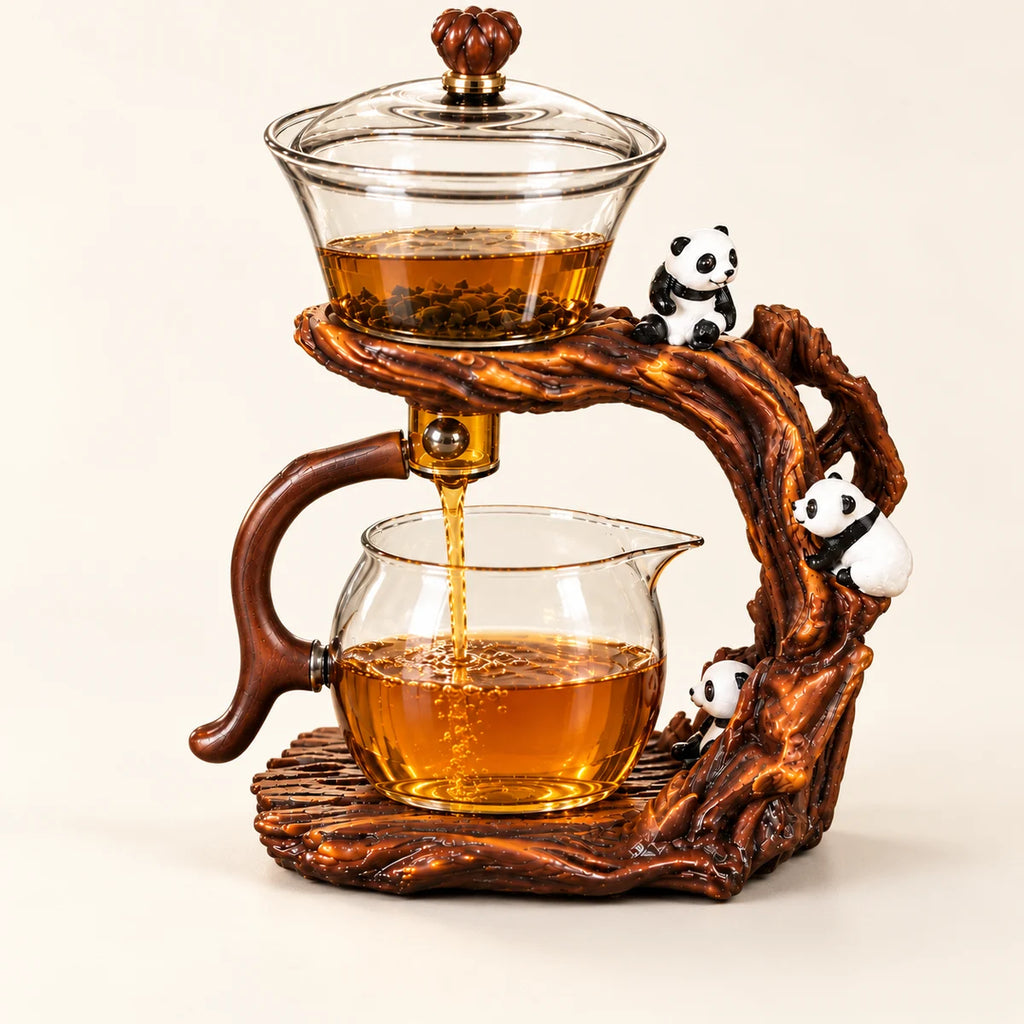 Panda Glass Teapot on a warm ivory studio background