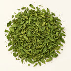 Peppermint Tea — 50g on a warm ivory studio background