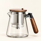 Press-Button Glass Tea Infuser on a warm ivory studio background