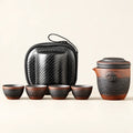 Travel Tea Set — 1 Pot, 4 Cups on a warm ivory studio background